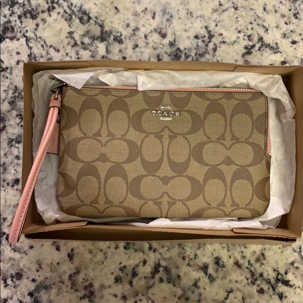 NEW NEVER BEEN USED Coach wristlet!